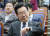 더불어민주당 이재명 대표가 25일 오후 국회에서 열린 의원총회에서 시간을 확인하고 있다. 연합뉴스