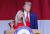 도널드 트럼프 전 미국 대통령과 함께 그의 전용기를 타고 조지아주 공화당 전당대회장에 도착한 마조리 테일러 그린 하원의원(공화·조지아)이 연설을 하고 있다. EPA=연합뉴스