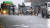  서울 전역에 호우주의보가 발효된 13일 서울 서초구 서울중앙지법 인근에서 우산을 쓴 시민들이 발걸음을 옮기고 있다. 뉴스1