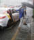 이날 서울 강남역 11번 출구 옆 빗물받이(배수구)가 막혀 일대 도로에 빗물이 차오르고 있는 모습. [연합뉴스]