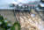 충북 괴산군 칠성면 사은리 괴산댐(칠성댐)에 물이 넘치는 월류가 발생해 주민 대피령이 내려졌다. 사진은 15일 방류중인 충북 괴산댐. [뉴스1]