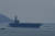 미국의 니미츠급 항공모함 USS 로널드 레이건호가 25일(현지시간) 베트남 남부 다낭 해역에 떠있다. 미국과 베트남의 '포괄적 파트너십' 10주년을 기념하기 위해 입항했다. AFP=연합뉴스