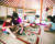 DR콩고 탕가니카호 인근 지역의 어린이들이 신설된 ‘유니세프아동친화공간’ 앞에서 유니세프 책가방을 받고 기뻐하고 있다. 오른쪽은 몽골 울란바토르의 친환경·고효율 게르에서 엄마와 함께 여가 시간을 보내는 아이들. [사진 유니세프한국위원회]