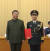 지난 2022년 1월 21일 상장(대장) 진급식에서 리위차오(오른쪽) 로켓군 사령관이 시진핑 주석에게 계급장을 받은 뒤 기념 촬영을 하고 있다. CC-TV 캡쳐