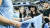 배우 전지현이 엘링 홀란의 사인을 받고 있다. 사진 맨시티 공식 유튜브 캡처