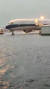 지난 2일 베이징 다싱국제공항 활주로. 폭우가 쏟아지면서 항공기 바퀴 아래 빗물이 차오르고 있다. 로이터=연합뉴스