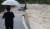 대구 군위군 효령면 한 마을 진입도로가 10일 오전 태풍 '카눈'이 쏟아낸 호우에 유실돼 있다. 연합뉴스