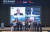 지난달 27일 서울 광진구 워커힐에서 열린 ‘글로벌 텔코 AI 얼라이언스 CEO 서밋’에서 참석자가 AI 사업 협력 업무협약(MOU)을 한 후 기념 촬영하고 있다. [사진 SK텔레콤]