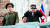 쌍안경으로 열병식 장면 보는 북한 김정은 국무위원장. 사진 조선중앙TV 캡처. 연합뉴스