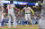 로날드 아쿠냐 주니어(오른쪽)가 1일(한국시간) LA 다저스전에서 2회 역전 만루홈런을 터트려 MLB 역사상 최초의 30홈런-60도루를 달성한 뒤 홈을 밟으며 환호하고 있다. AP=연합뉴스