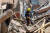 11일 모로코 알하우즈의 지진 피해 지역에서 한 구조대원이 잔해를 헤치며 생존자를 찾고 있다.AFP=연합뉴스