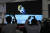 인도 우주연구기구(ISRO)에서 관계자들이 23일 달 탐사선 찬드라얀 3호 착륙 생방송을 지켜보고 있다. [AP=연합뉴스]