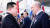 김정은 북한 국무위원장(왼쪽)과 블라디미르 푸틴 러시아 대통령이 13일(현지시간) 아무르주 보스토치니 우주기지에서 4년 5개월 만에 다시 만나 악수하고 있다. AP=연합뉴스