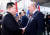 블라디미르 푸틴 러시아 대통령(오른쪽)과 김정은 북한 국무위원장이 13일(현지시간) 러시아 아무르주 보스토치니 우주기지에서 악수하고 있다. AP=연합뉴스