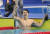 김우민이 28일 항저우 아시안게임 수영 남자 자유형 800ｍ 결선에서 금메달을 확정한 뒤 기뻐하고 있다. 
