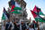 9일(현지시간) 포르투갈 리스본에서 팔레스타인 해방 협회가 주최한 시위에 사람들이 참여해있다. EPA=연합뉴스