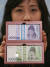 2007년 1월 새롭게 바뀐 1만원권과 1천원권 지폐.
