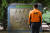 14일 오전 서울 서초구 소방학교내에 있는 홍제동 순직사고 추모 조형물앞에서 한 소방관이 서 있다. [중앙일보]