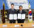권혁범 HBGA 의장(왼쪽)과 전호환 동명대학교 총장이 업무협약을 위한 MOU를 체결했다 (사진제공 = HBGA)