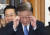 이재명 대표가 1일 국회 의원회관에서 열린 '민주경제토크 - 위기 속 한국경제의 미래를 말하다'에 참석하며 안경을 고쳐쓰고 있다. 연합뉴스 