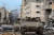 이스라엘 군인들이 탄 전차가 22일 팔레스타인 무장 정파 하마스가 장악하고 있는 가자지구 북부 최대 도시인 가자시티 거리를 지나가고 있다. 로이터=연합뉴스