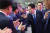 윤석열 대통령이 28일 일산 킨텍스 1전시관에서 열린 '제21기 민주평통 전체회의'에서 참석자들과 악수하고 있다. 대통령실사진기자단