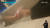 광주의 한 술집 직원이 아르바이트생의 발가락에 휴지를 끼운 뒤 불을 붙이는 모습. 사진 KBC 광주방송 캡처