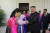 김정은 북한 국무위원장이 4일 제5차 전국어머니대회에서 어머니들과 손을 맞잡은 모습. 노동신문. 뉴스1.