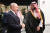 6일(현지시간) 사우디아라비아의 수도 리야드를 방문한 블라디미르 푸틴 러시아 대통령(왼쪽)이 사우디아라비아의 실권자 무함마드 빈살만 왕세자와 악수하고 있다. 타스=연합뉴스