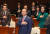 국민의힘 윤재옥 원내대표와 의원들이 8일 국회에서 열린 의원총회에서 국기에 경례하고 있다. 연합뉴스