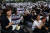 사망한 서이초 교사의 49재이자 '공교육 멈춤의 날'인 4일 오후 서울 여의도 국회의사당 앞에서 열린 서이초 교사 49재 추모집회에서 참석자들이 손피켓을 들어 구호를 외치고 있다. 뉴스1