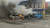 30일 러시아 벨고로드에서 구조대원들이 자동차에 붙은 불을 끄고 있다. 신화통신=연합뉴스