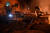 지난달 30일 우크라이나 하르키우에서 러시아군의 공습으로 붕괴된 건물에서 화재 진압을 하는 소방관들. 러시아군은 하르키우에 S-300 미사일 최소 6발을 발사해 호텔 등을 파괴했다. [AFP=연합뉴스]