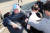 2일 오전 부산 강서구 대항전망대에서 이재명 더불어민주당 대표를 흉기로 기습한 피의자가 흉기를 든 채 경찰에 연행되고 있다. 뉴시스