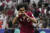카타르 간판 골잡이 아크람 아피프가 레바논과의 아시안컵 개막전에서 득점포를 터뜨린 뒤 세리머니를 선보이고 있다. AP=연합뉴스