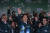 13일 치러진 대만 총통 선거에서 승리한 라이칭더(가운데) 민진당 후보가 지지자들의 환호에 손을 흔들어 화답하고 있다. 사진 왼쪽은 쑤전창 행정원장(총리 격), 오른쪽은 샤오메이친 부총통 당선인. AP=연합뉴스