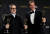 프로듀서 벤 윈스턴(왼쪽)과 엘튼 존의 배우자 데이비드 퍼니시가 무릎 수술로 불참한 엘튼 존을 대신해 대리 수상했다. 로이터=연합뉴스