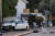 이스라엘 보안 부대원들이 차량 돌진 테러가 발생한 텔아비브 북쪽 도시 라아나나의 버스정류장을 조사하고 있다. AP=연합뉴스
