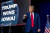 도널드 트럼프 전 미국 대통령이 공화당의 첫 대선 경선에서 1위를 확정한 15일(현지시간) 아이오와주 디모인의 경선 승리 축하 파티 무대에 오르고 있다. AP=연합뉴스