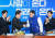더불어민주당 이재명 대표가 24일 오전 국회에서 열린 인재환영식에서 김남근 변호사에게 당 점퍼를 입혀준 뒤 기념촬영을 하고 있다. 연합뉴스