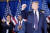 미국 공화당 대선 경선에 출마한 도널드 트럼프 전 대통령이 지난 23일 뉴햄프셔 오픈 프라이머리(예비 선거) 도중에 연설을 한 뒤 지지자들에게 주먹을 쥐고 인사하고 있다. [AP 연합뉴스]