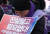 10.29 이태원 참사 유가족들이 30일 서울 종로구 정부서울청사 앞에서 이태원참사 특별법 공포 촉구 기자회견을 하고 있다. 뉴시스