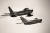 에어쇼에서 시범 비행 중인 F-86(위)과 MiG-15. 1세대 전투기 시대의 전설적인 라이벌이다. 위키피디아