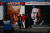 지난달 27일 미국 네바다주 라스베이거스에서 도널드 트럼프 전 대통령 지지자들이 트럼프와 로널드 레이건 전 대통령의 사진 앞에서 촬영을 하고 있다. AFP=연합뉴스