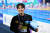 지난 12일(한국시간) 세계선수권 남자 자유형 800ｍ에서 금메달을 딴 뒤 기뻐하는 김우민. AFP=연합뉴스