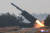  김정은 북한 국무위원장은 지난 14일 오전, 해군에 장비하게 되는 신형 지상대해상 미사일 '바다수리-6형' 검수 사격 시험을 지도했다고 조선중앙통신이 15일 보도했다. 연합뉴스