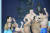 17일(한국시간) 2024 국제수영연맹 세계선수권 남자 계영 800ｍ 결선에서 중국에 0.10초 차로 뒤져 은메달을 딴 뒤 머리를 감싸는 양재훈, 김우민, 이호준(왼쪽부터). AP=연합뉴스 