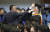 지난 16일 오후 대전 한국과학기술원(KAIST·카이스트) 학위 수여식에서 한 졸업생이 윤석열 대통령에게 항의하자 경호원들로부터 제지를 당하고 있다. 뉴스1