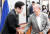 지난해 5월 8일 국회 간담회에서 만난 이재명 민주당 대표(왼쪽)와 박석운 전국민중행동 공동대표(오른쪽). 뉴스1
