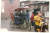 삼륜차는 저장촌의 가내공방에서 생산한 옷을 인근 시장으로 운반했다. [사진 글항아리]